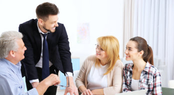 man having a discussion to his co-workers