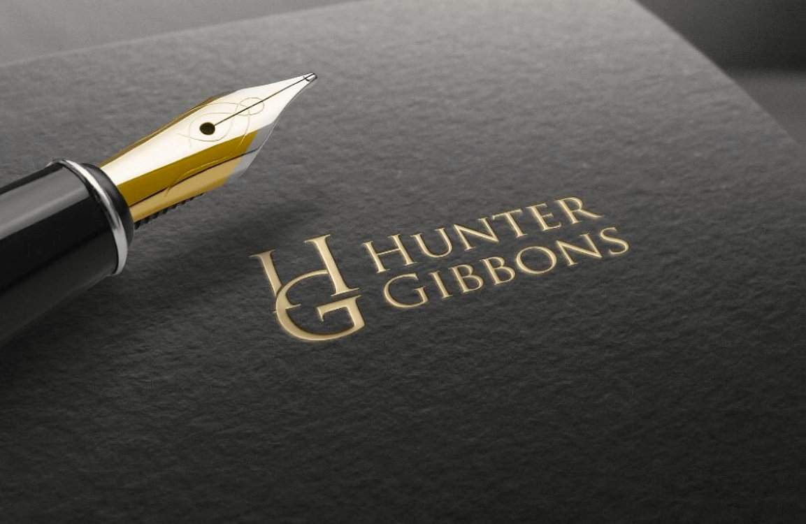 pen and notebook with brand name hunter gibbons